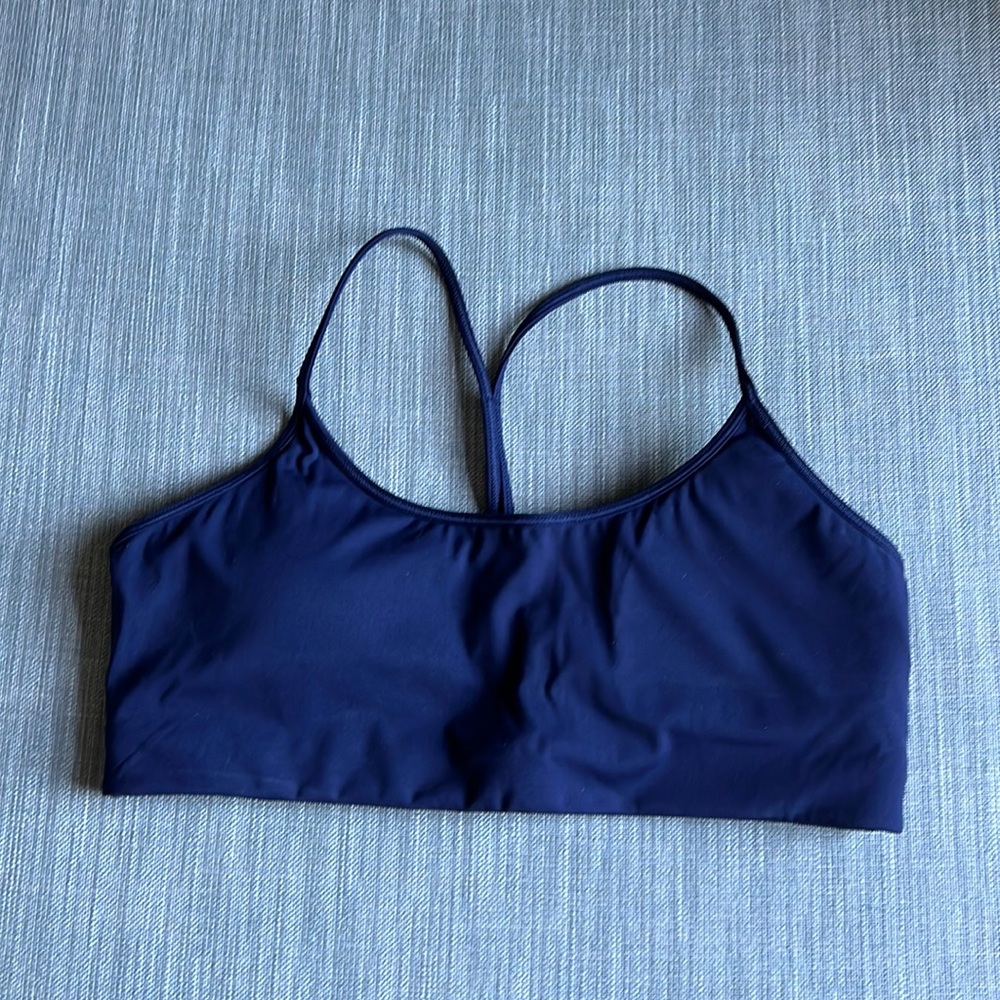 All Access. Never worn size L sports bra with removable pads. Navy blue.
